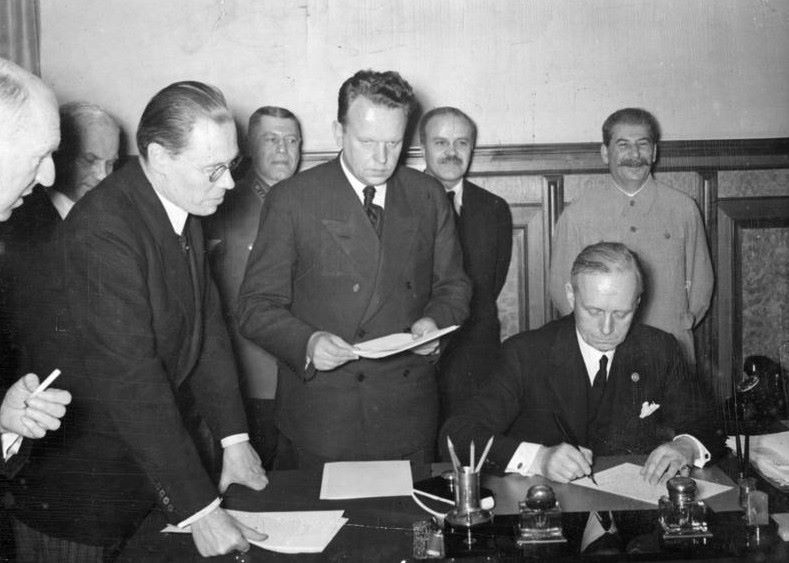 Signing the Nazi-Soviet Non-Aggression Pact, August 1939: A strategic alliance that divided Eastern Europe.