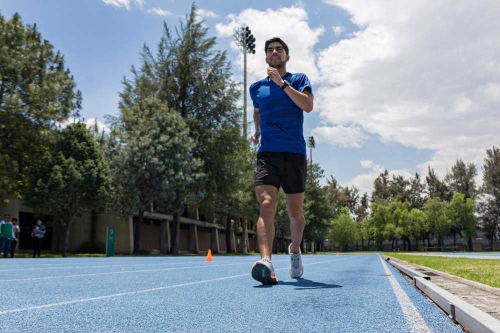 Andrés Olivas, a determined racewalker, focuses intently on his goal of Olympic success in Paris 2024.