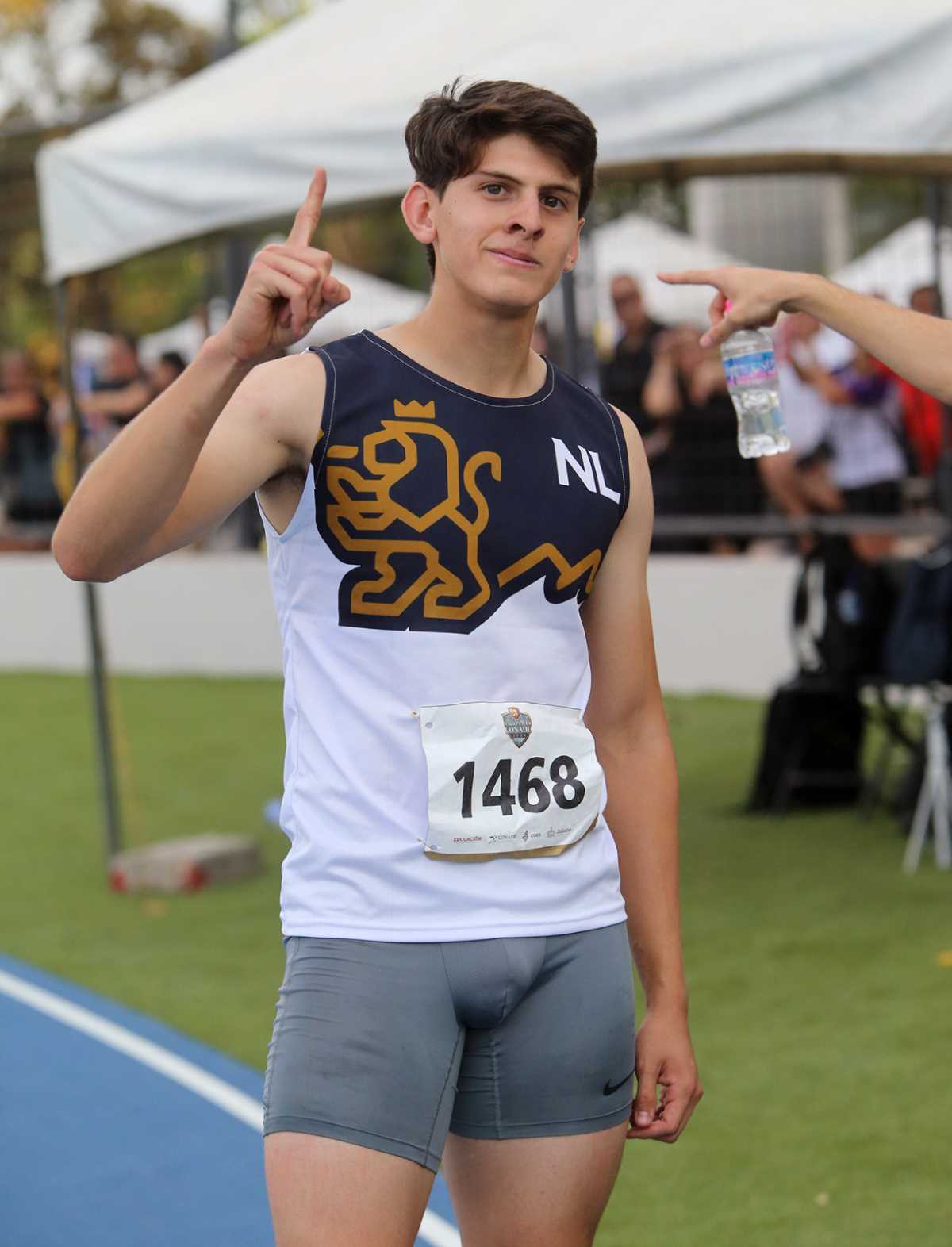 José Eduardo Aguado Peña celebrating after winning the 110-meter hurdles at the CONADE 2024 Nationals in Jalisco.