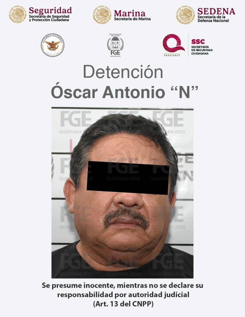 Police custody image of Óscar Antonio N. following his arrest in connection with taxi union investigation.