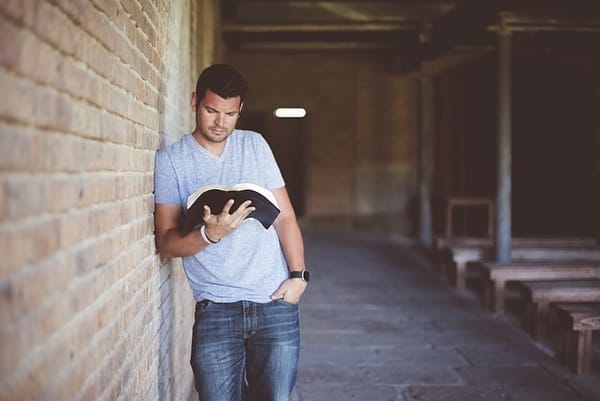 Reading a book.