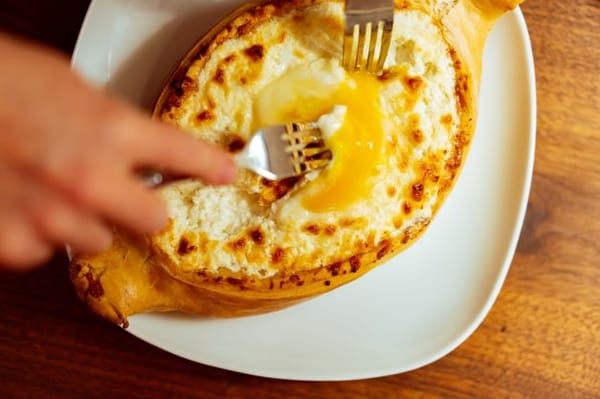 Georgians love their cheesy khachapuri bread.