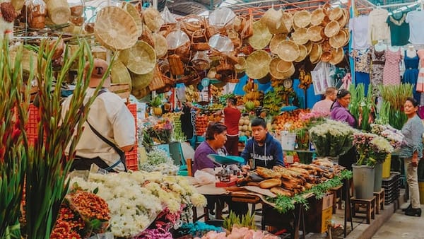 Market scene in Mexico with people shopping.