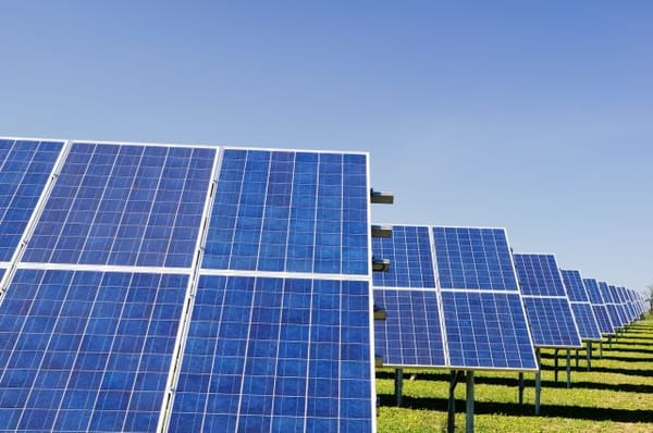 Clean and green energy: A row of solar panels generating renewable electricity from the sun's rays.