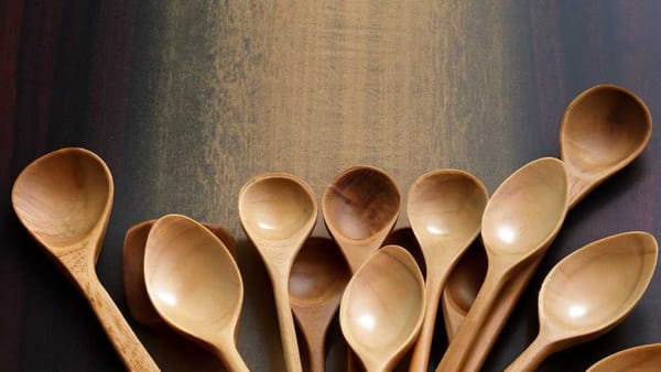 Wooden spoons, cherished in kitchens worldwide, symbolize tradition and the love infused into every dish.