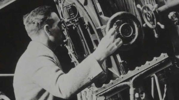 Edwin Hubble at his telescope: The man whose gaze into the cosmos revolutionized our understanding.