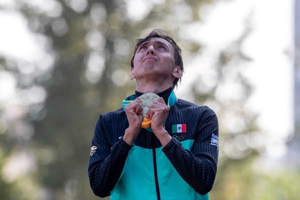 Emiliano Hernández Uscanga raises his arms in victory at Cairo's World Cup.