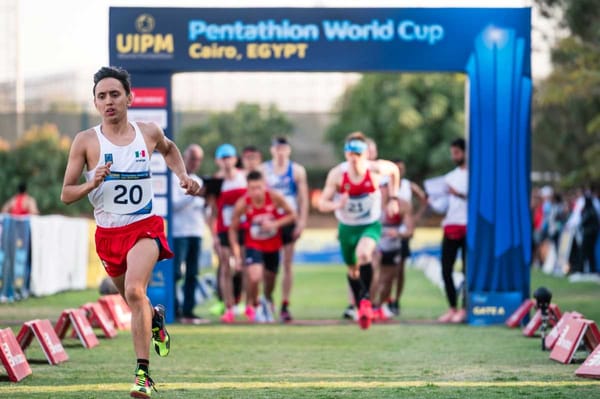 Emiliano Hernández Uscanga celebrates victory in the Cairo World Cup qualifiers, showcasing his determination and skill.