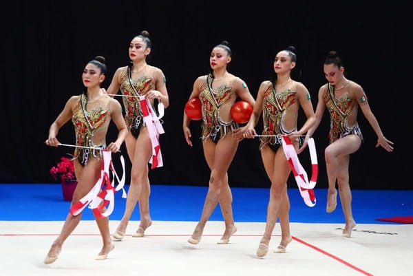 Mexico's rhythmic gymnastics team celebrates their gold medal victory in the All-Around competition at the Aphrodite Cup.