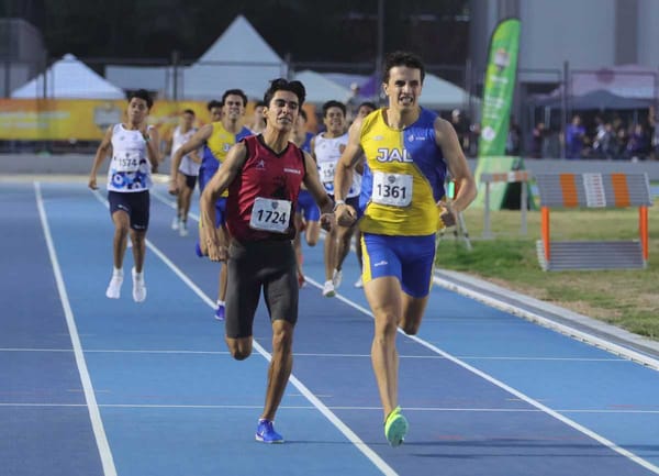 Israel Tinajero Álvarez crossing the finish line to secure the gold medal in the U-23 800 meter dash at the CONADE Nationals.