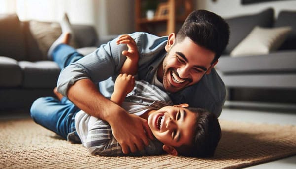 A Mexican father and child playfully wrestle on the living room floor, both smiling.