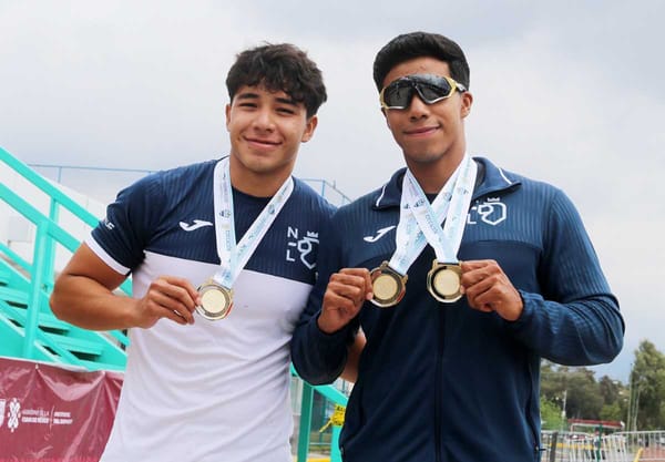 José Roberto and Cristian Guillermo Eguía Alcázar standing together, each holding a gold medal at Nationals CONADE 2024.