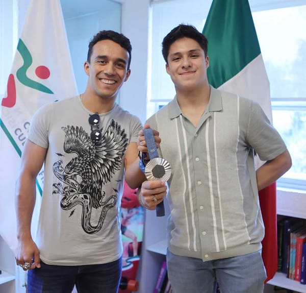 Juan Manuel Celaya and Osmar Olvera enjoy their moment as Olympic medalists.