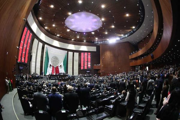 Politicians taking their seats in the Chamber of Deputies chamber.