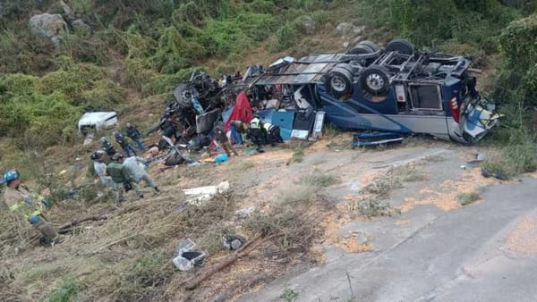 Emergency responders and wreckage at the site of a fatal bus accident on highway 44-D in Mexico.