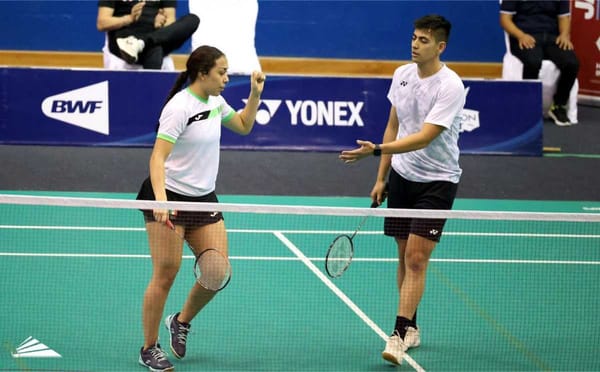 Mexican badminton champions Luis Armando Montoya and Miriam Rodríguez celebrate their gold medal victory.